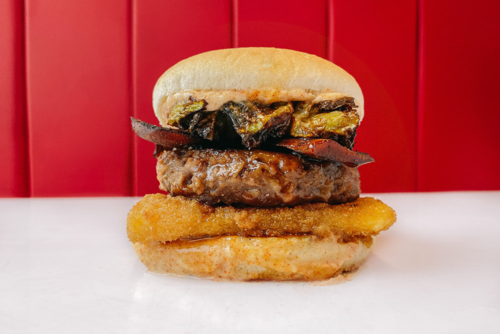 Halo Burger Teams up with THIS to Launch the Ultimate Vegan Festive Burger with Bacon and Fried Sprouts!