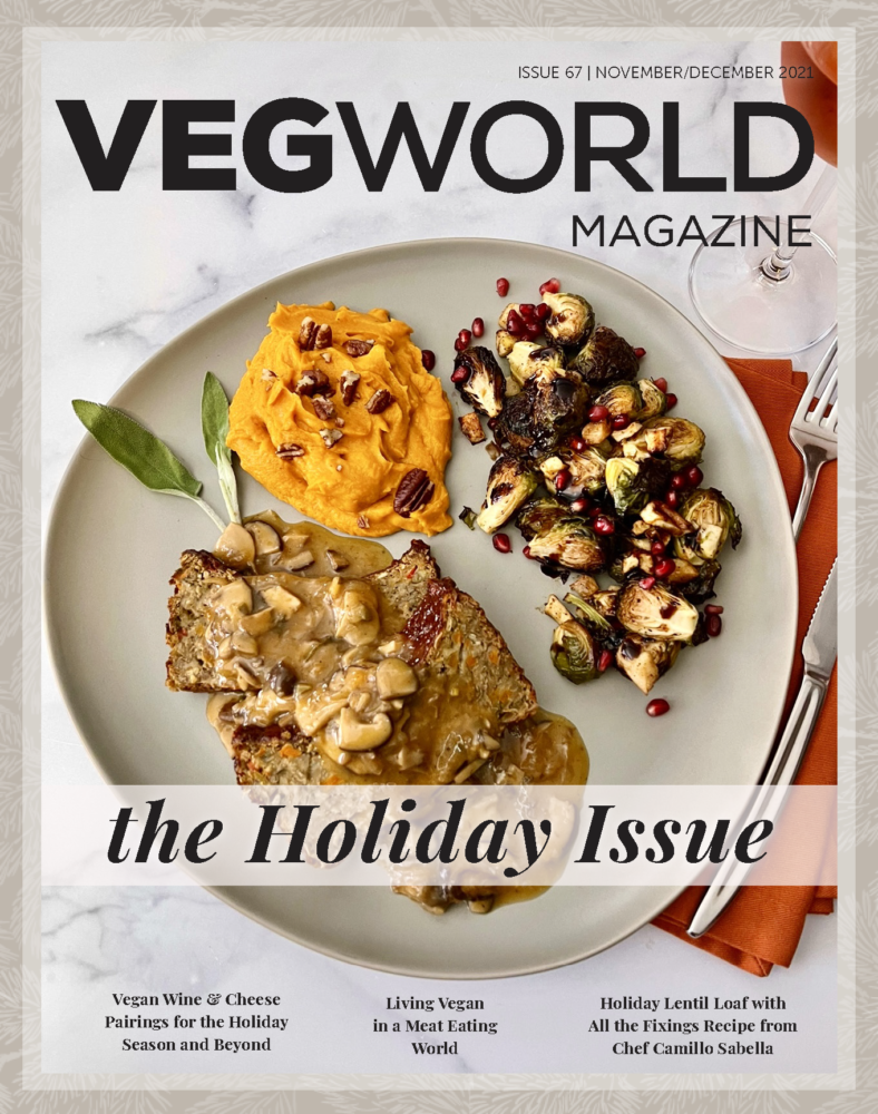 The cover image of The Holiday Issue featuring a plate of vegan loaf, mashed sweet potatoes, and Brussels sprouts