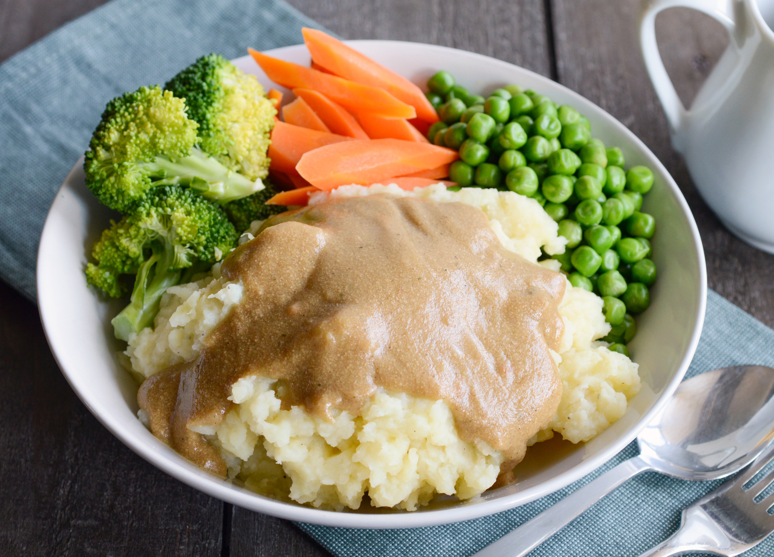 Creamy Golden Gravy Over Mashed Potatoes￼